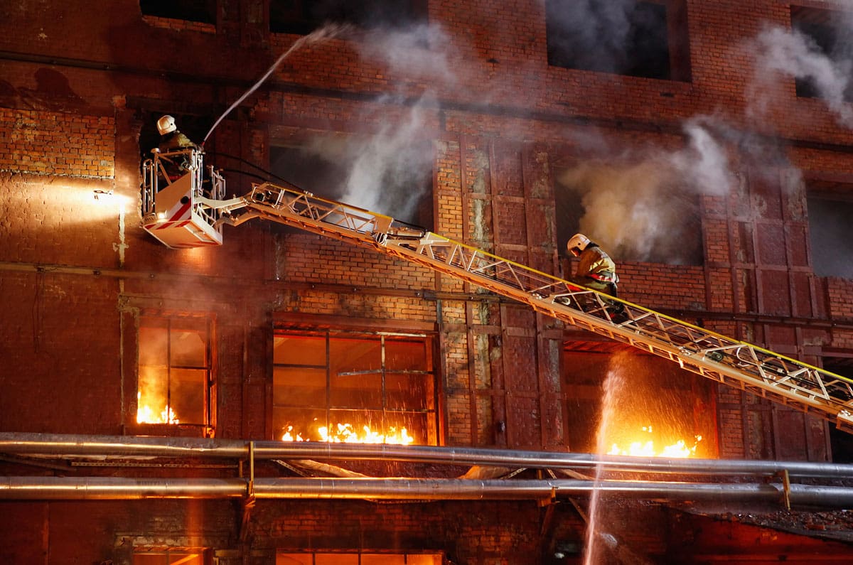firemen putting out a fire
